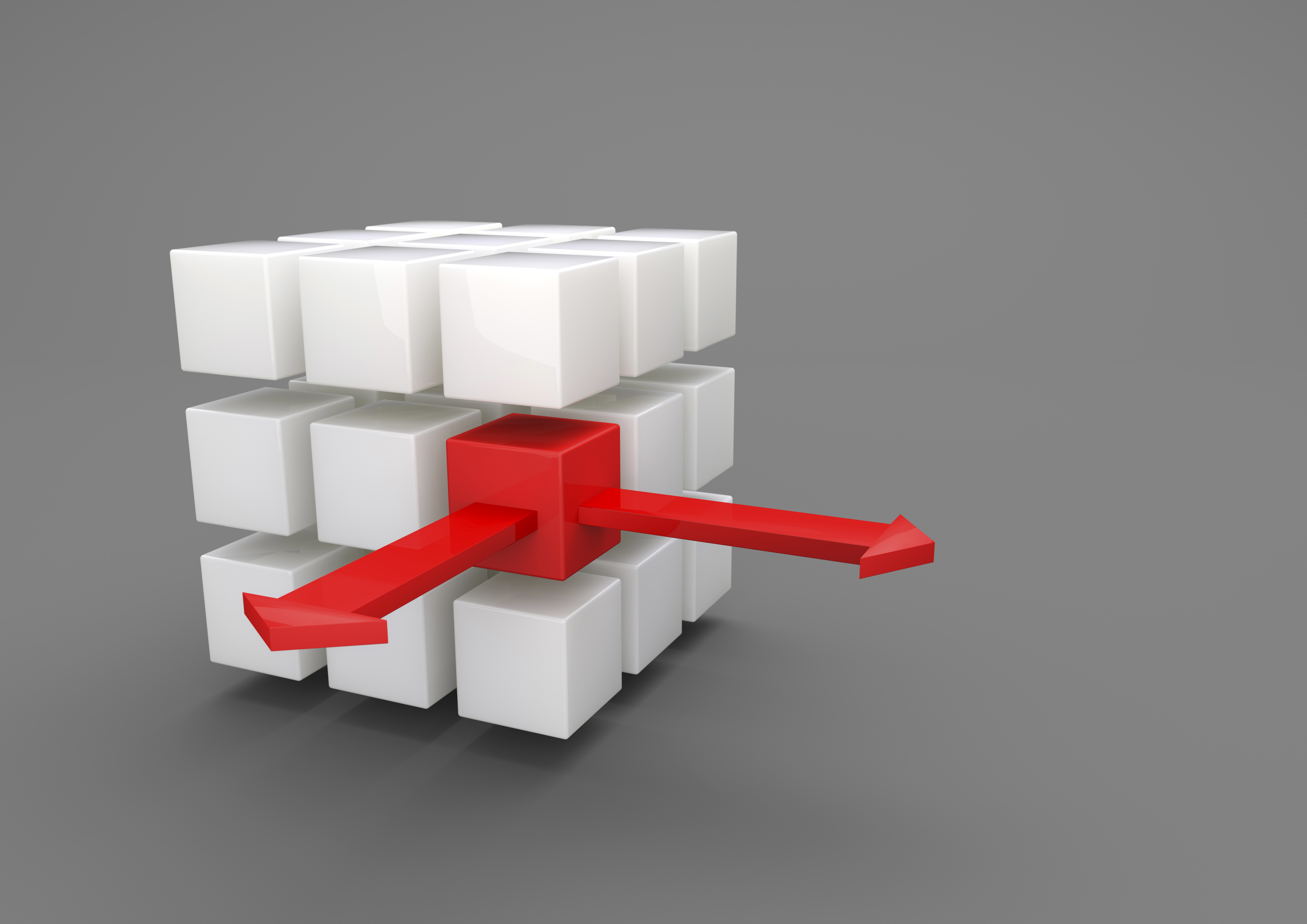 Image of a white cube with smaller red cubes being outsourced.