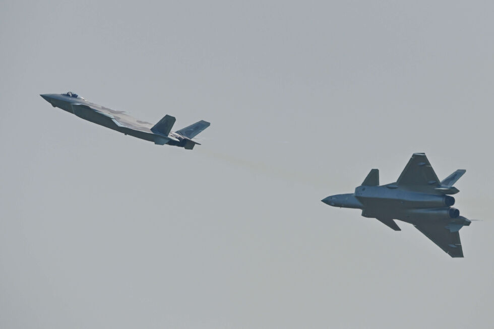 Two examples of China's fifth-generation fighter, the Chengdu J-20, performing this year at the 13th China International Aviation and Aerospace Exhibition in Zhuhai, China. 