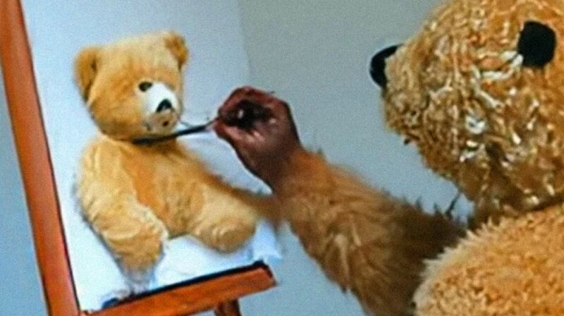 Still image from an AI-generated video of a teddy bear painting a portrait.