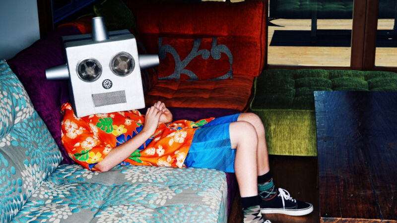 Boy in Living Room Wearing Robot Mask