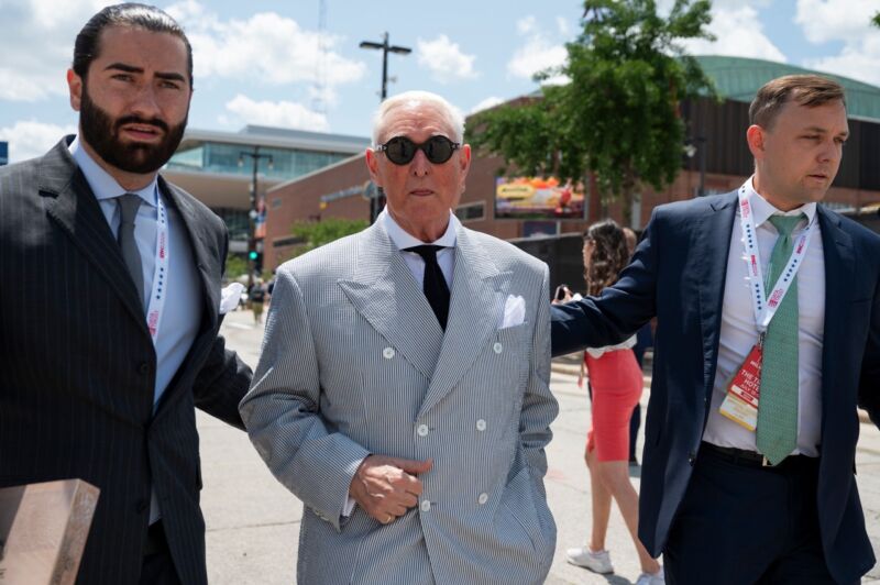 Roger Stone, former adviser to Donald Trump's presidential campaign, center, during the Republican National Convention (RNC) in Milwaukee on July 17, 2024.